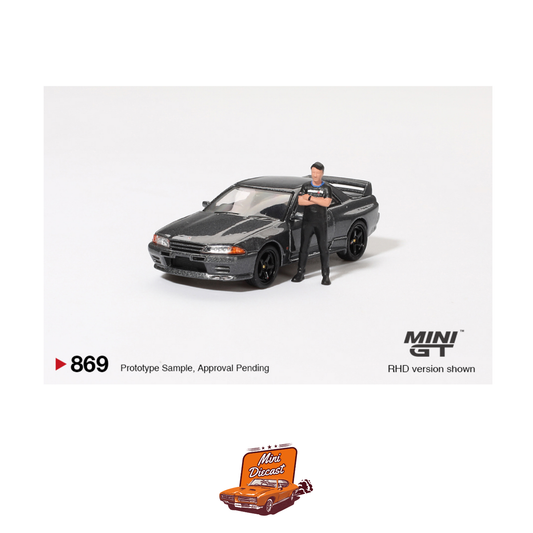 Mini GT #869 Nissan Skyline GT-R (R32) – Gunmetal (With Matsuda Figure)