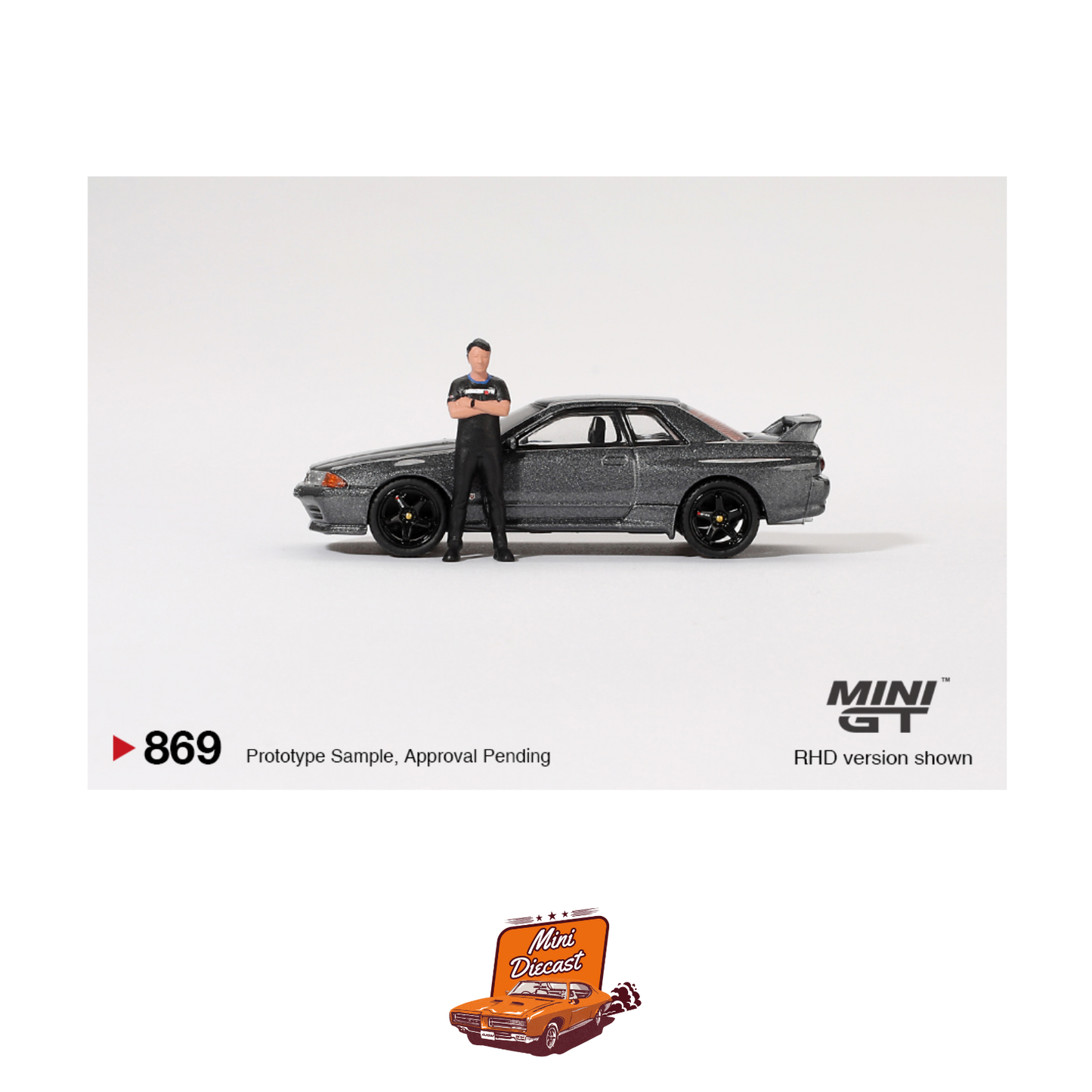 Mini GT #869 Nissan Skyline GT-R (R32) – Gunmetal (With Matsuda Figure)