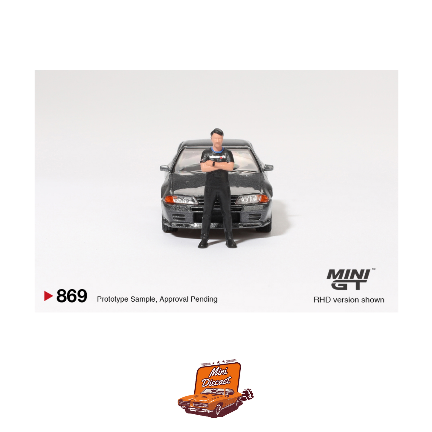 Mini GT #869 Nissan Skyline GT-R (R32) – Gunmetal (With Matsuda Figure)
