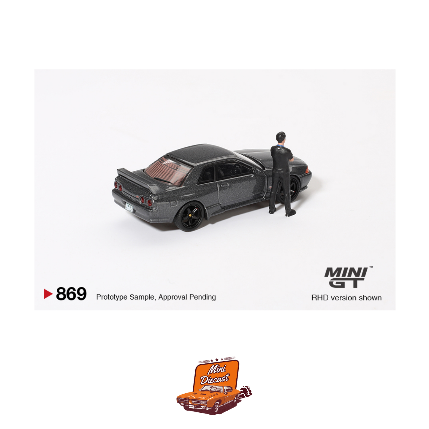 Mini GT #869 Nissan Skyline GT-R (R32) – Gunmetal (With Matsuda Figure)